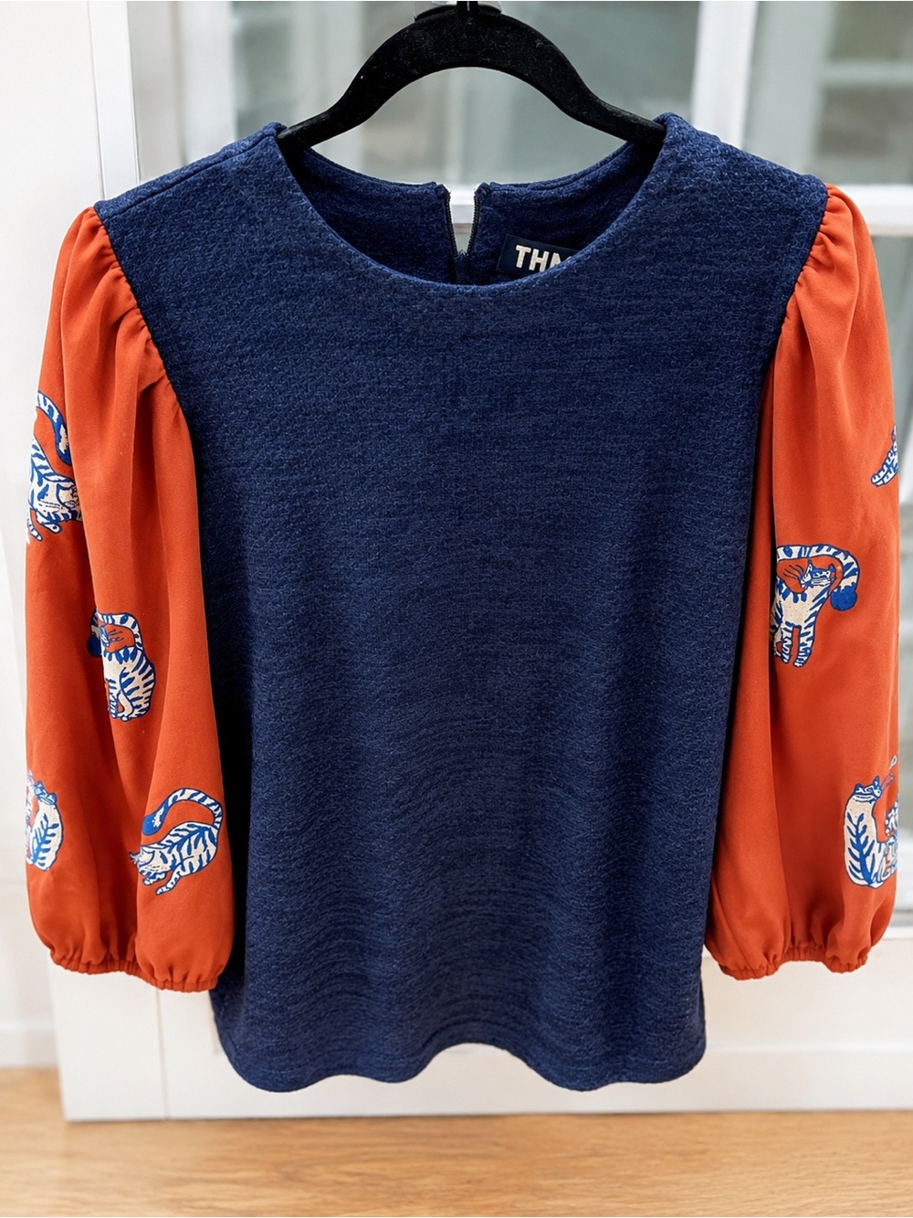 THML Navy Knit Front Top with Orange Printed Puff Sleeves